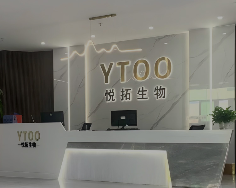 Dark textured background featuring the YTOO logo in golden font, with a silhouette of a person exhaling vapor.
